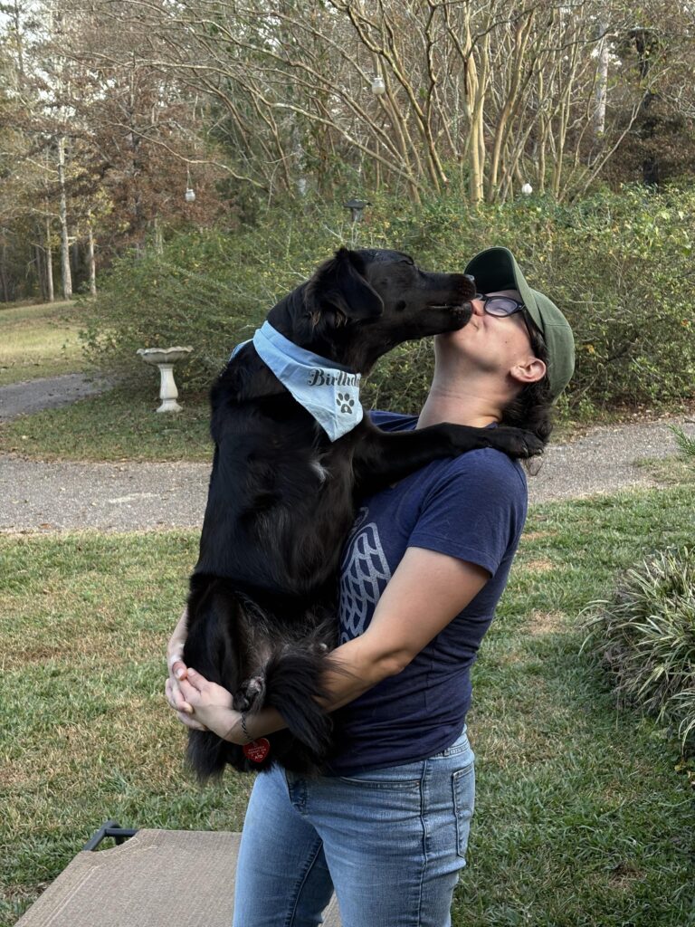 Tripawd Marilyn giving her mom a kiss