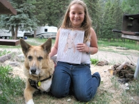 Mackenzie with Jerry and her portrait of him