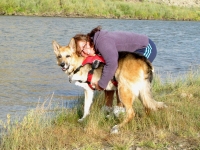 Rene hugs Jerry by the S. Platte River while camping near Sinclair, WY